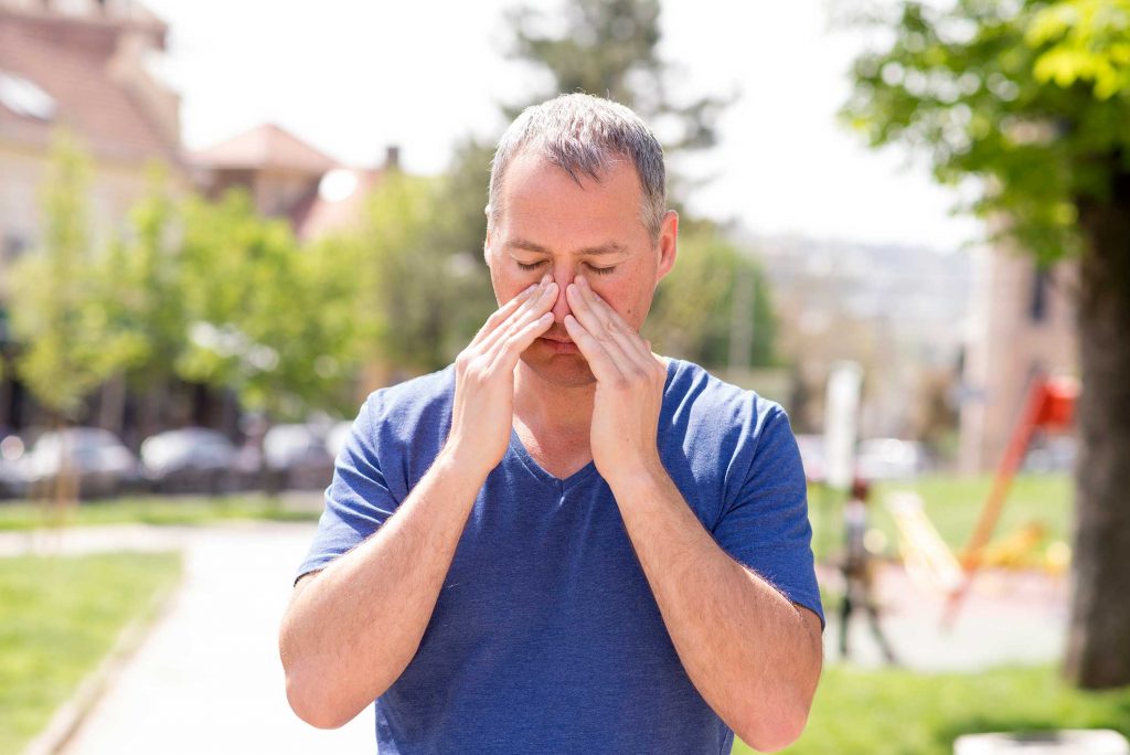 Man wondering if he has a sinus infection