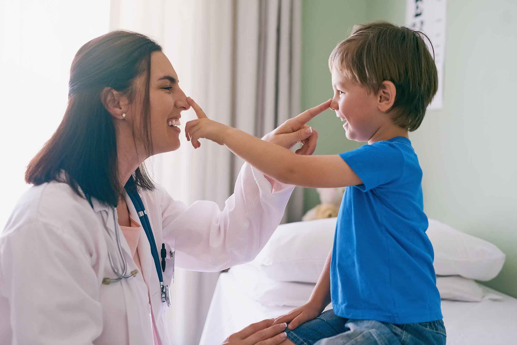 Doctor playing with a young patient